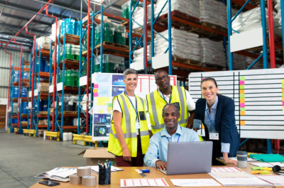 four people inside the warehouse